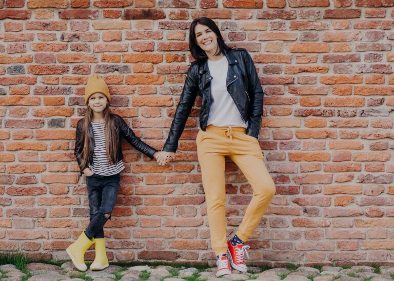 mom and daughter wearing shoes