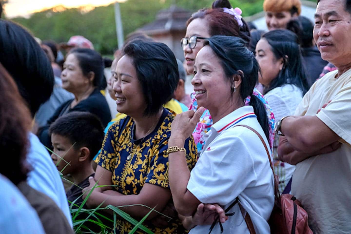 people standing and smiling