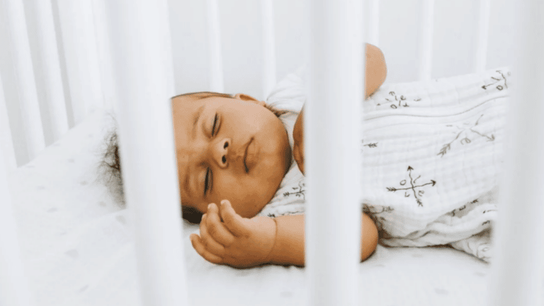 baby sleeping in a crib