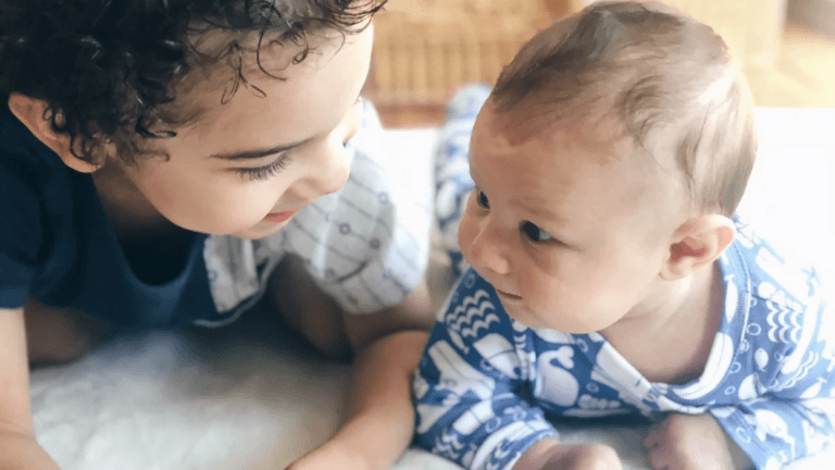 siblings-doing-tummy-time-together