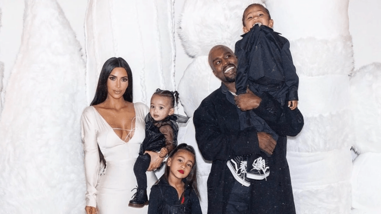 Kim Kardashian and Kanye West with their kids