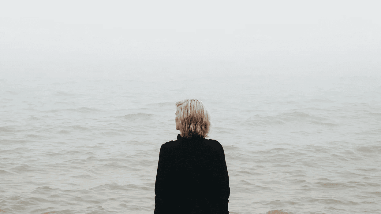 woman overlooking a body of water