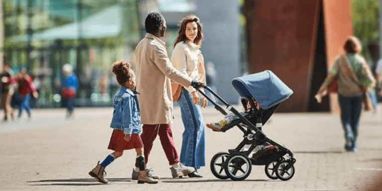 parents pushing a stroller