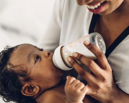 mother practicing combination feeding with infant