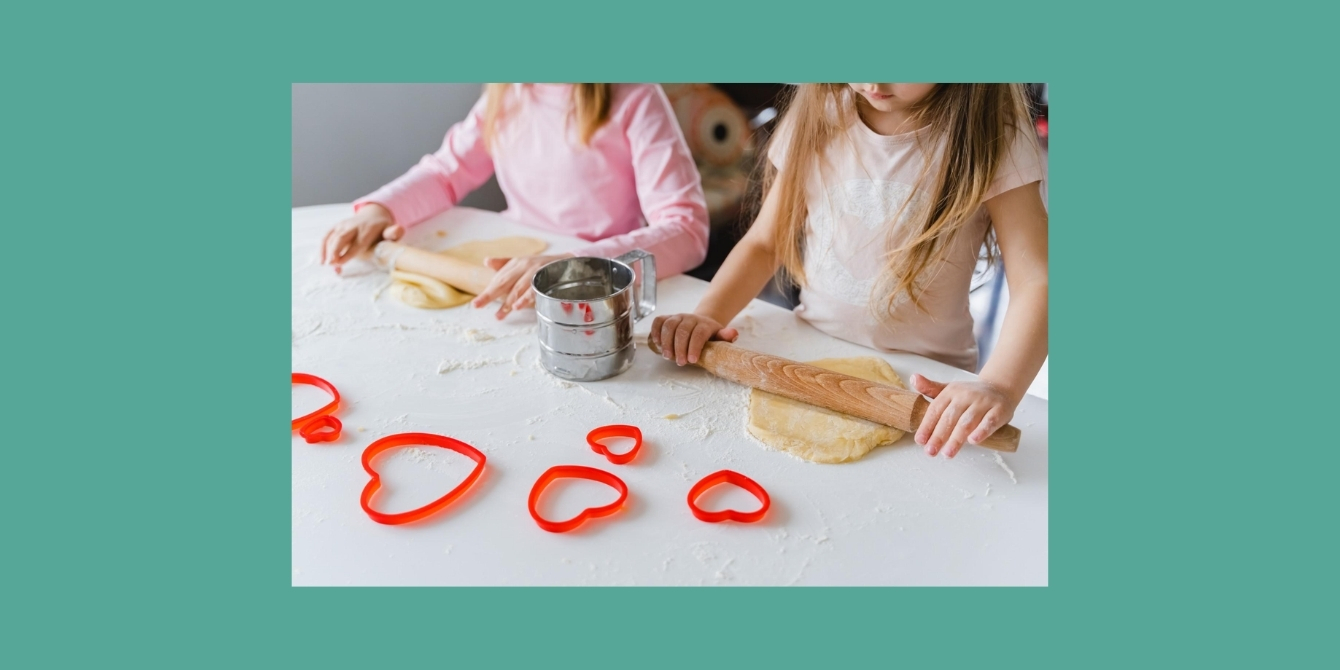 Kids making heart-shaped treats