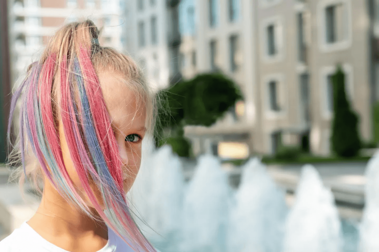 Girl paints mother's face with long-lasting dye leaving her bright