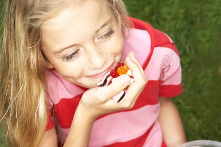 girl eating freeze dried candy