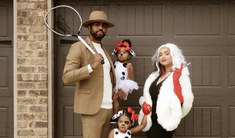 family dressed up as chacaracters from 101 dalmations- family halloween costumes