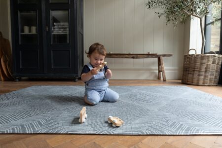 toddler playing on floor