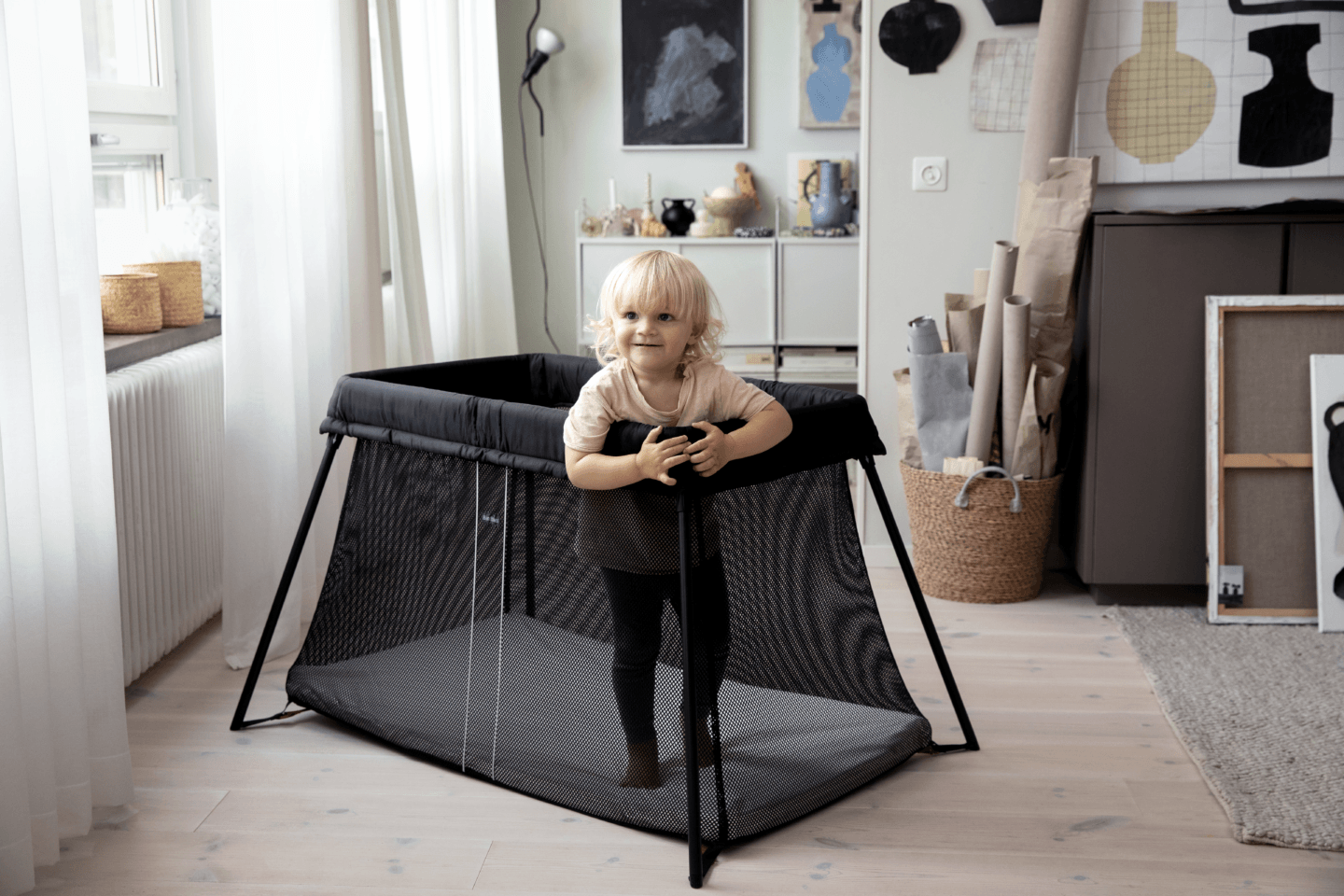 040280 travel crib light black lifestyle babybjorn 0160 - Motherly