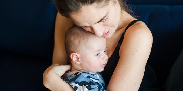 woman holding baby