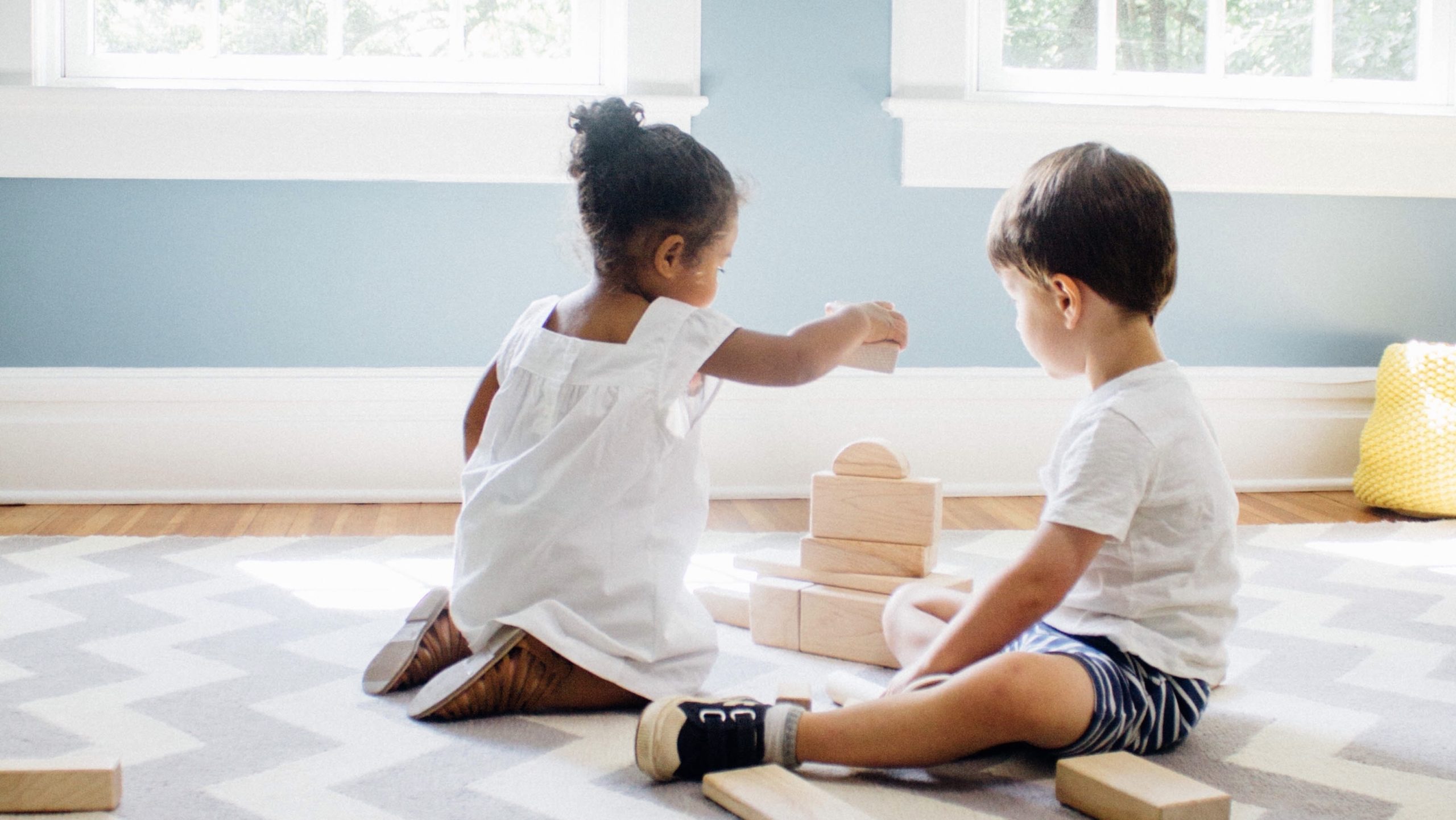 kids playing with wooden block