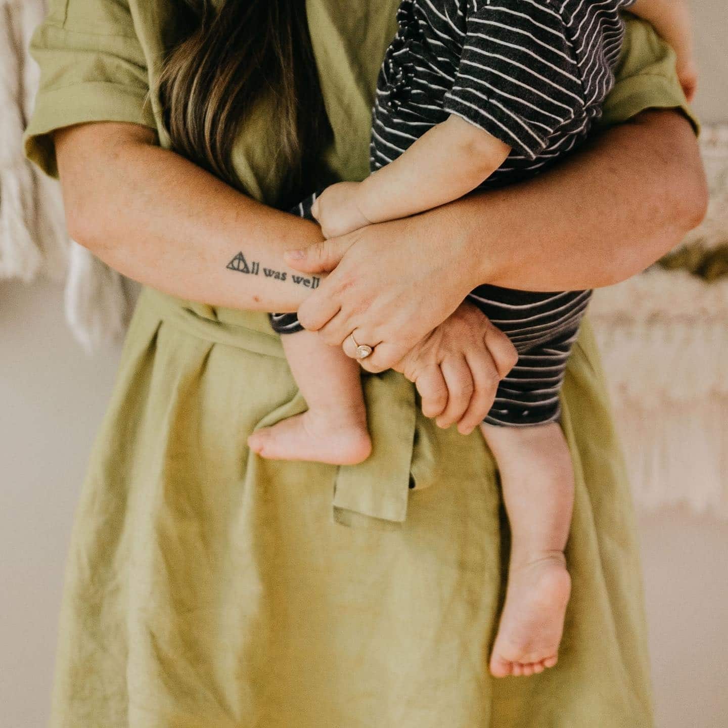 mom holding toddler