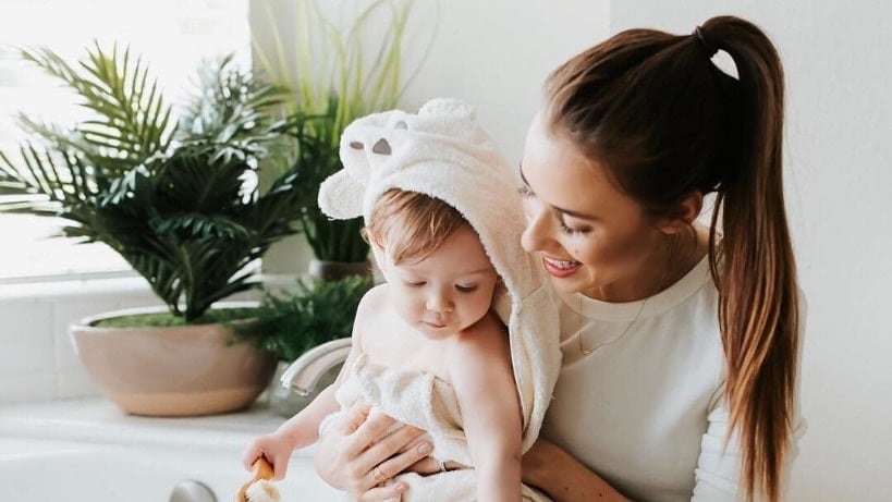 mom with child after bath - routines for kids