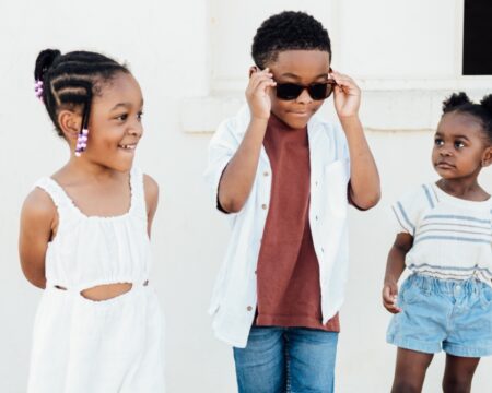 three stylish kids wearing new clothes Motherly