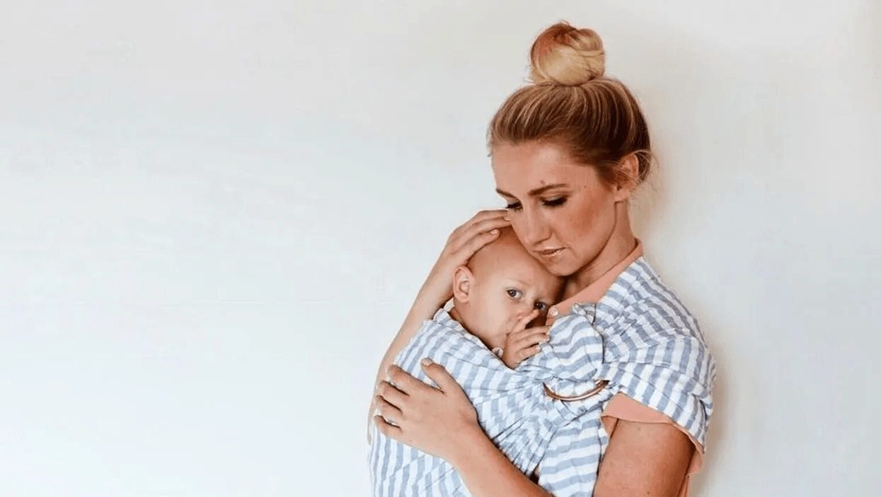 Mom and baby in wrap carrier