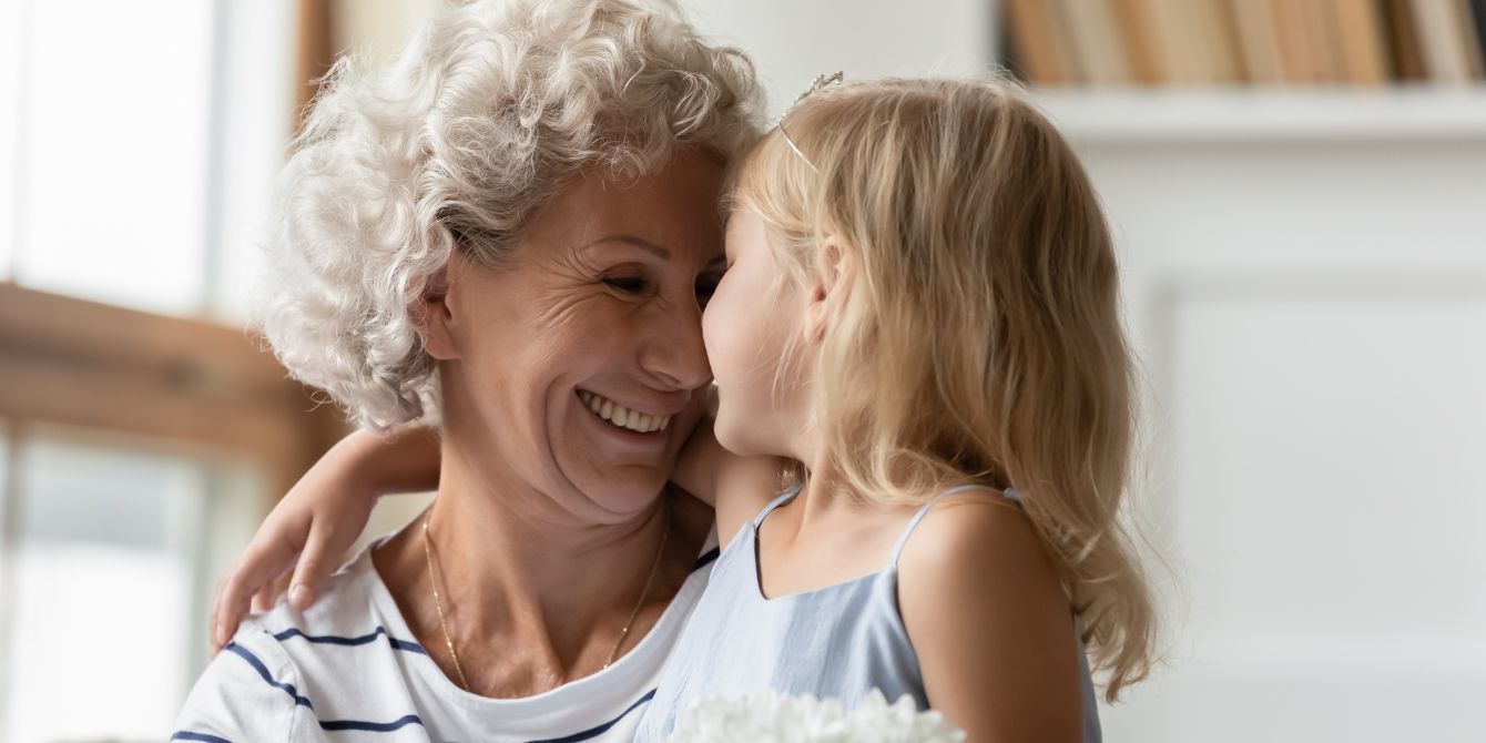 grandma and grandchild hug