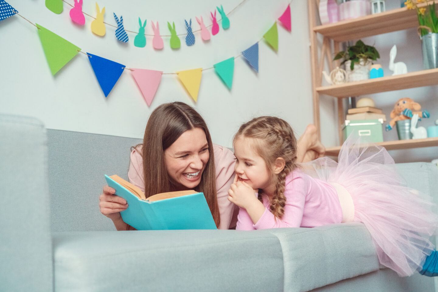 Mother and daughter reading book