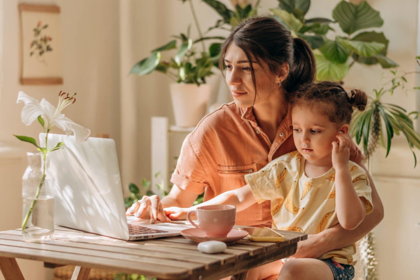 Working mom holding baby career break