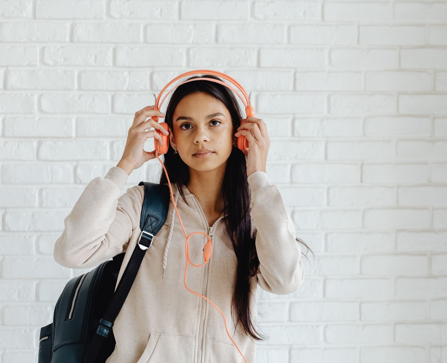 teenage girl wearing headphones