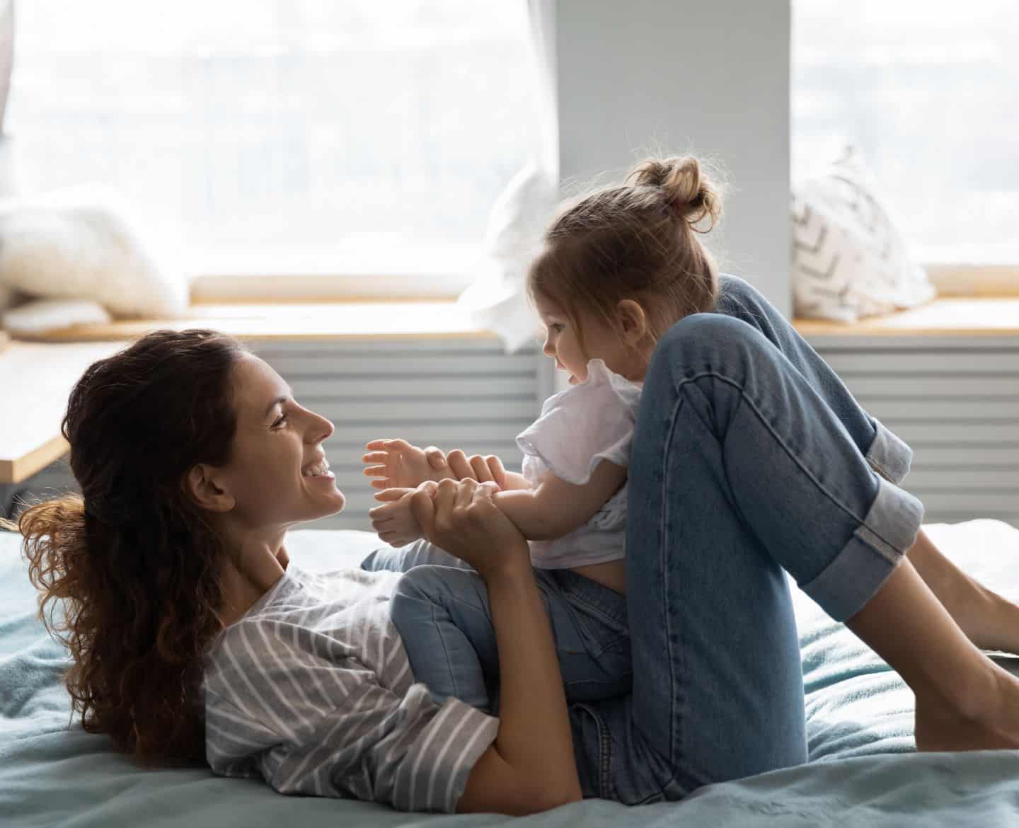 https://www.mother.ly/wp-content/uploads/2022/07/mom-playing-with-happy-child.jpg