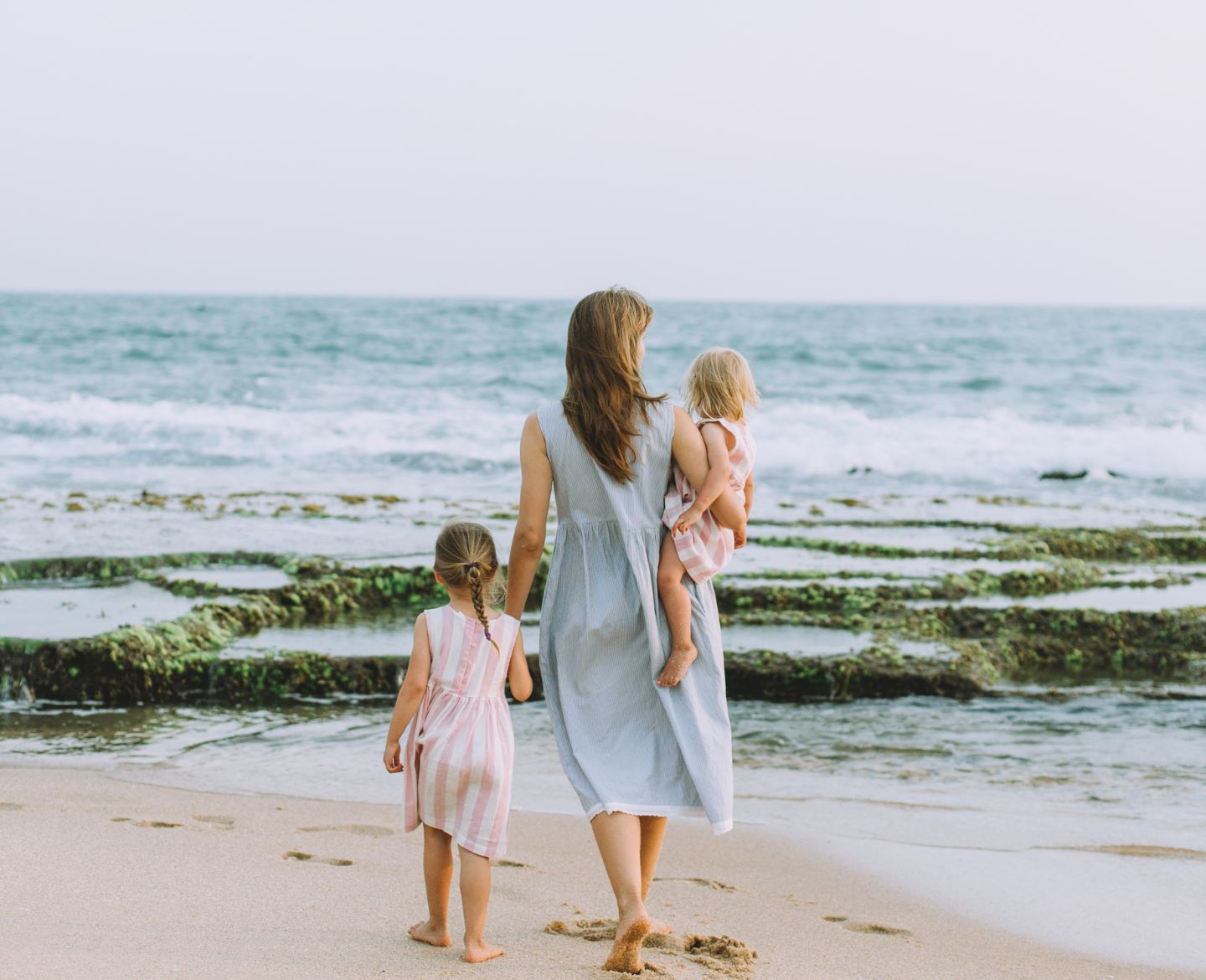 mom on beach with daughters - single mom
