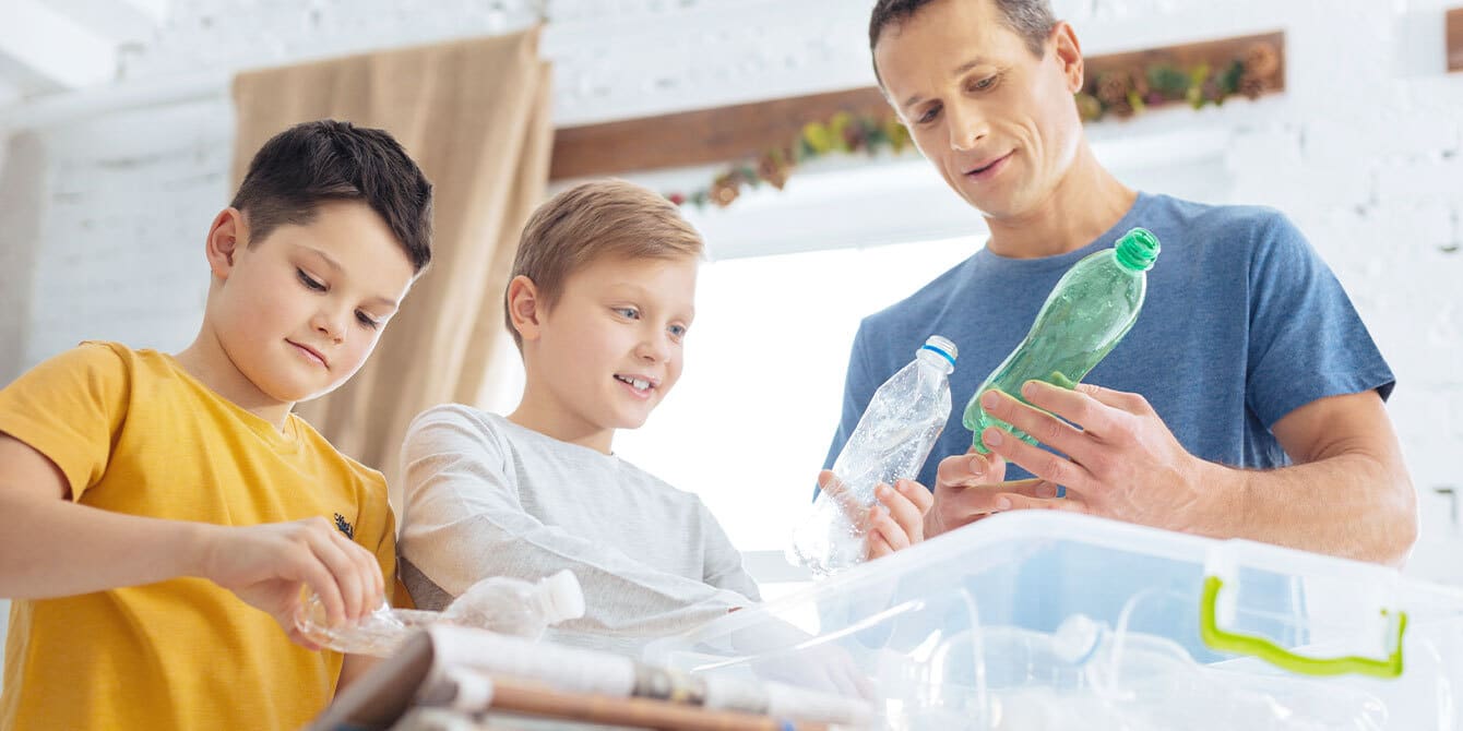 dad-and-two-sons-recycling