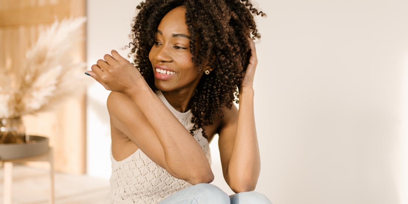 young woman with hands in her hair - solo date