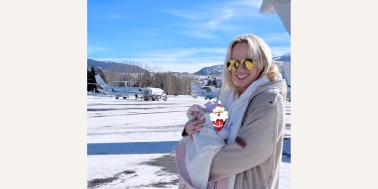 Rebel Wilson holding her baby