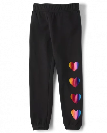 black joggers with metallic hearts