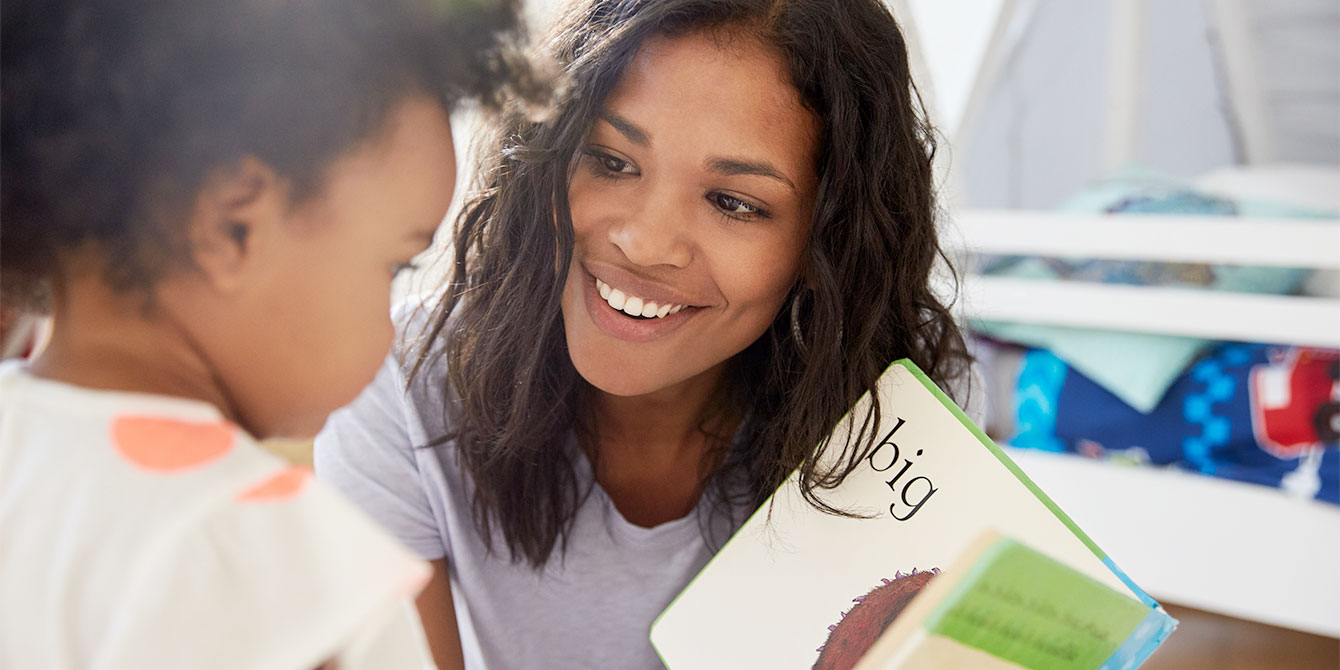 mom helping her child with Toddler language development