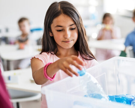 school kids in classroom learning about waste separation