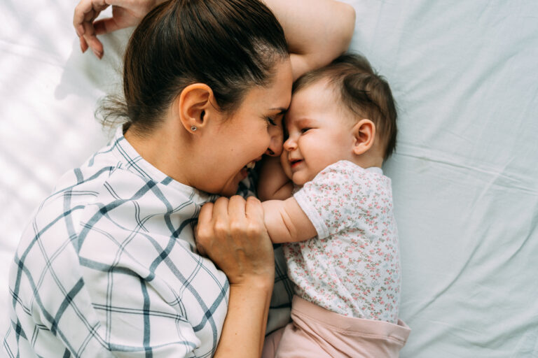 mom and baby snuggling Motherly