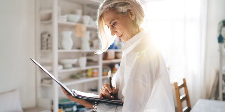 woman overcoming imposter syndrome while trying to work on her laptop