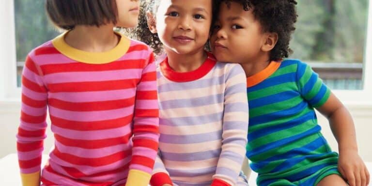 children wearing striped hanna andersson clothing