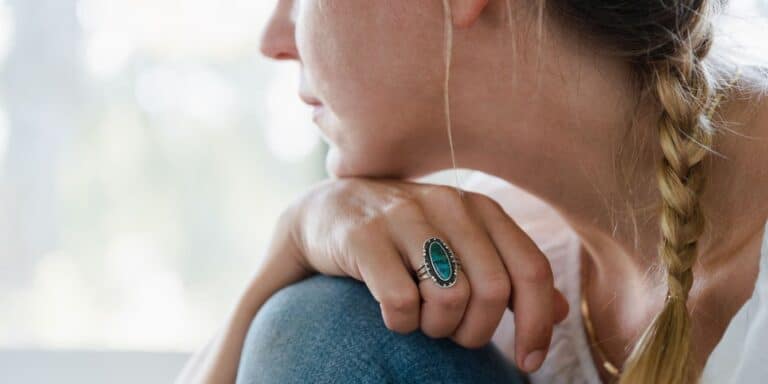 woman in thoughtful pose - am i ready for a baby