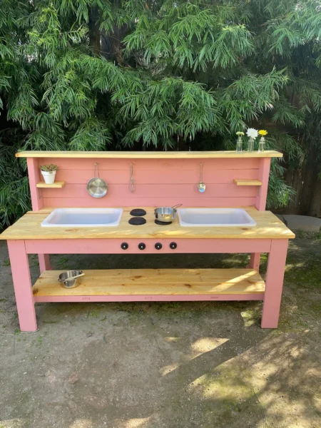 https://www.mother.ly/wp-content/uploads/2023/06/Wood-N-Poppy-Hand-Made-Wooden-Toy-Kitchen--450x600.webp