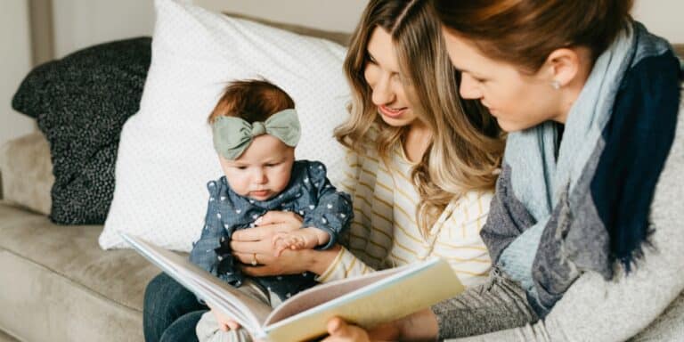 moms reading to baby - early literacy activities for babies