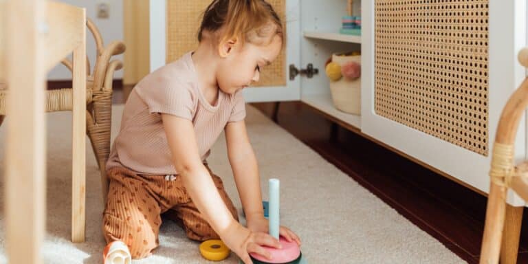 little girl playin cozy corner - cozy corner