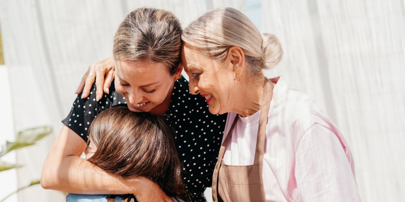 three women hugging