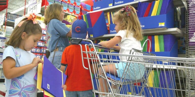 Mom and kids shopping for school supplies