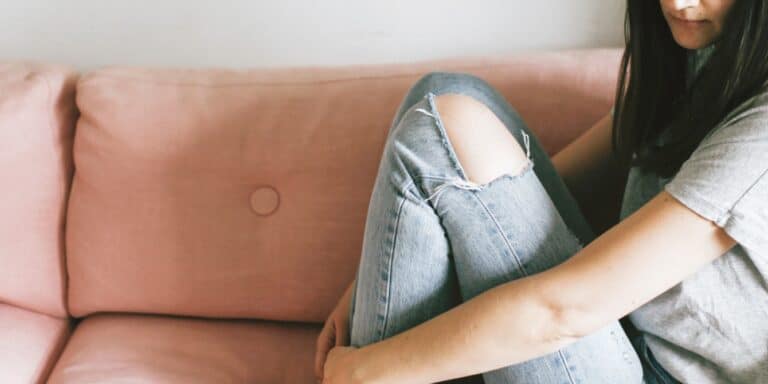 woman sitting on the couch- time to sit