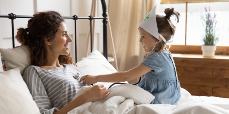 mom and daughter playing doctor power reversal play