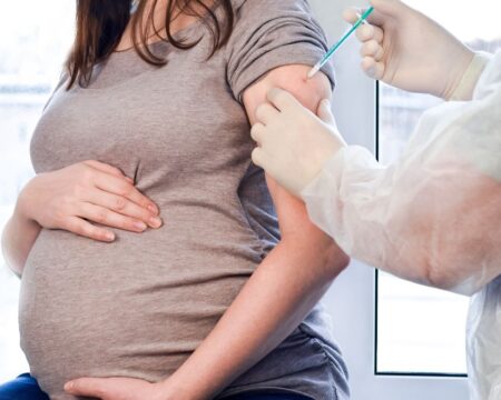 pregnant woman getting vaccine 1 Motherly