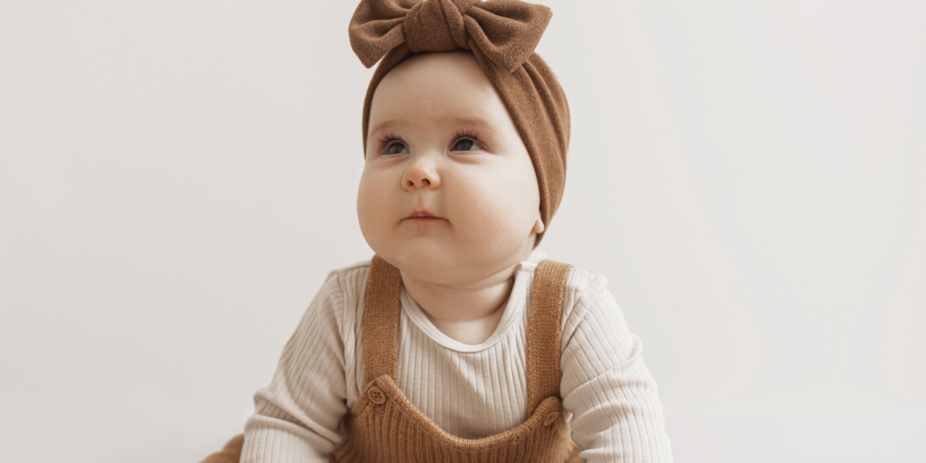 https://www.mother.ly/wp-content/uploads/2023/11/baby-girl-portrait.jpeg