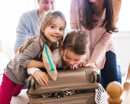 https://www.mother.ly/wp-content/uploads/2023/11/family-packing-for-trip-thanksgiving-travel-with-kids-450x360.jpg