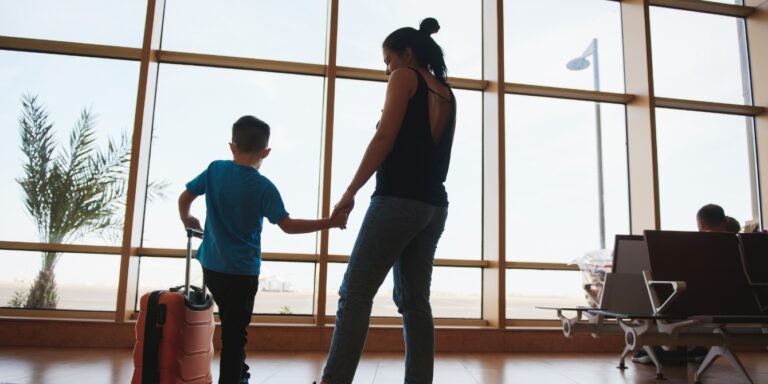 mother and son at the airport traveling with a child with autism