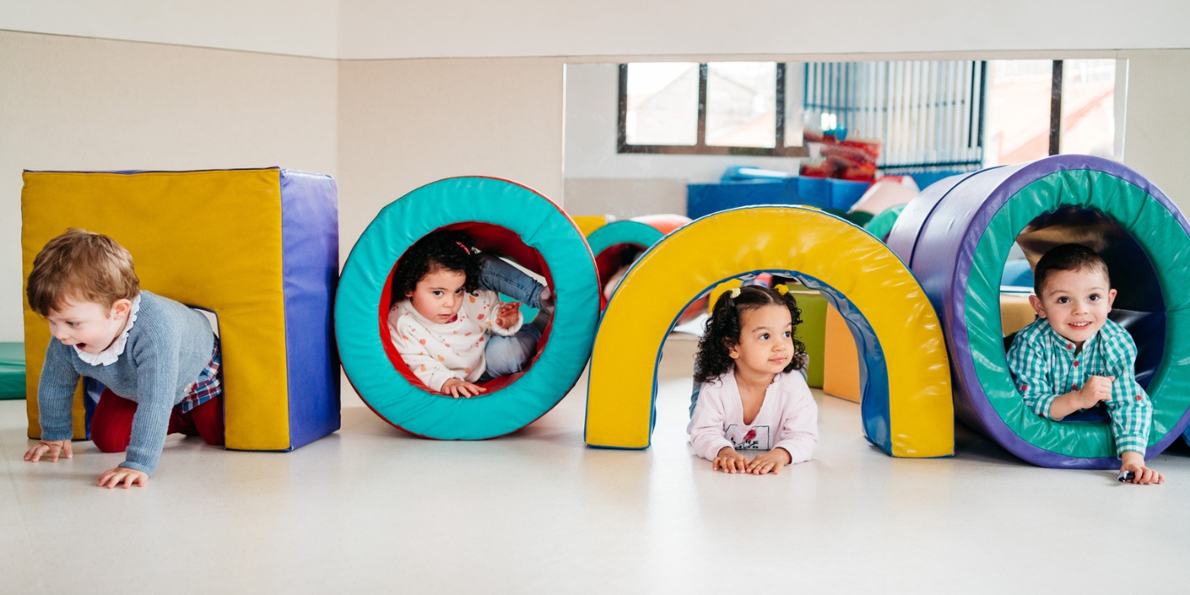 kids playing on indoor playground public libraries