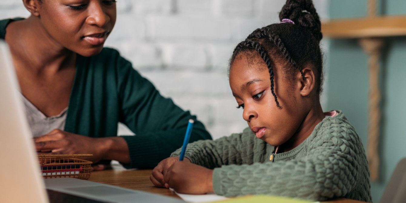 mom helping young daughter with homework choose your hard