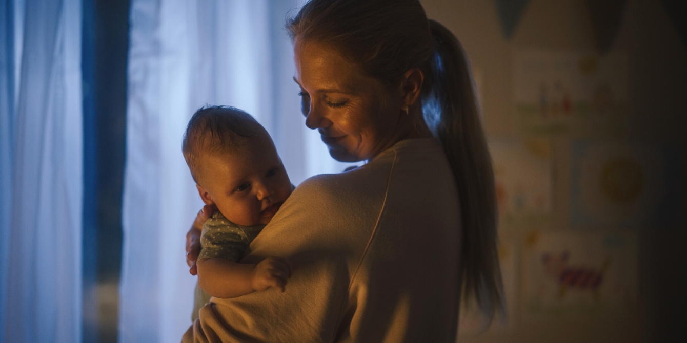 mom holding baby- postpartum preeclampsia